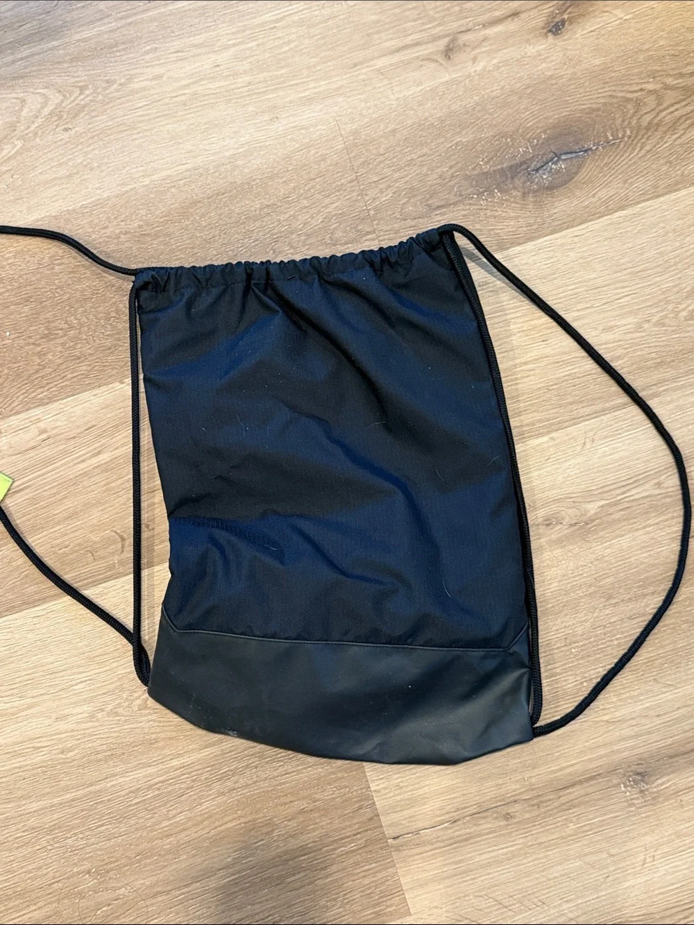 Nike Black Drawstring Backpack with White Swoosh